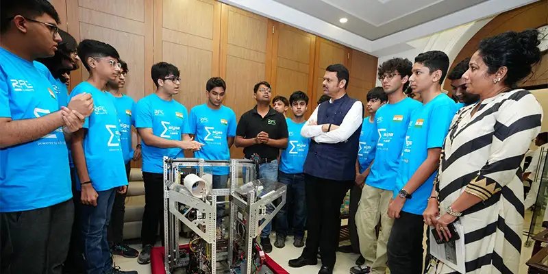 Team Sigma 9692 students with their robot in Mumbai